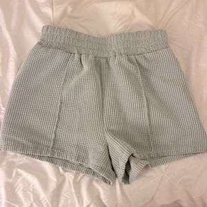green corduroy shorts
